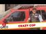 Crazy Cop Smashes Car Window